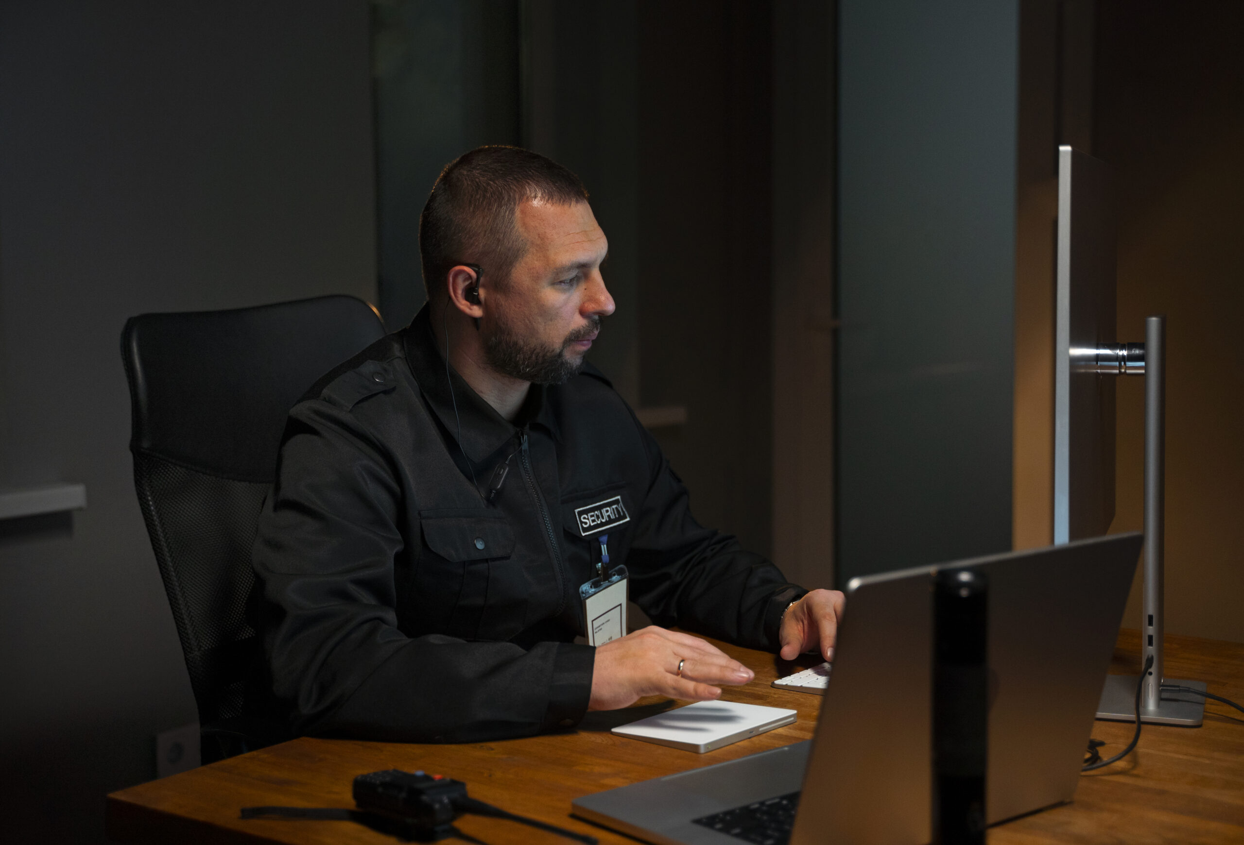 Security personnel working from an operations workspace